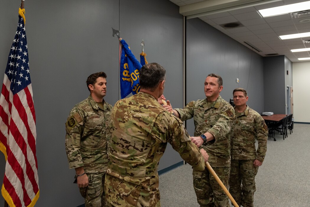 U.S. Air Force Maj. Christopher Schutte receives command of the 169th Air Support Operations Squadron, Illinois Air National Guard, at the change of command ceremony held at the 182nd Airlift Wing, Peoria, Illinois, Feb. 2, 2023.