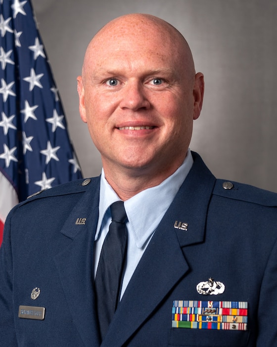 U.S. Air Force Capt. Nathan Schamberger, the commander of the 182nd Maintenance Operations Flight, Illinois Air National Guard, poses for a portrait in Peoria, Illinois, Nov. 7, 2021.