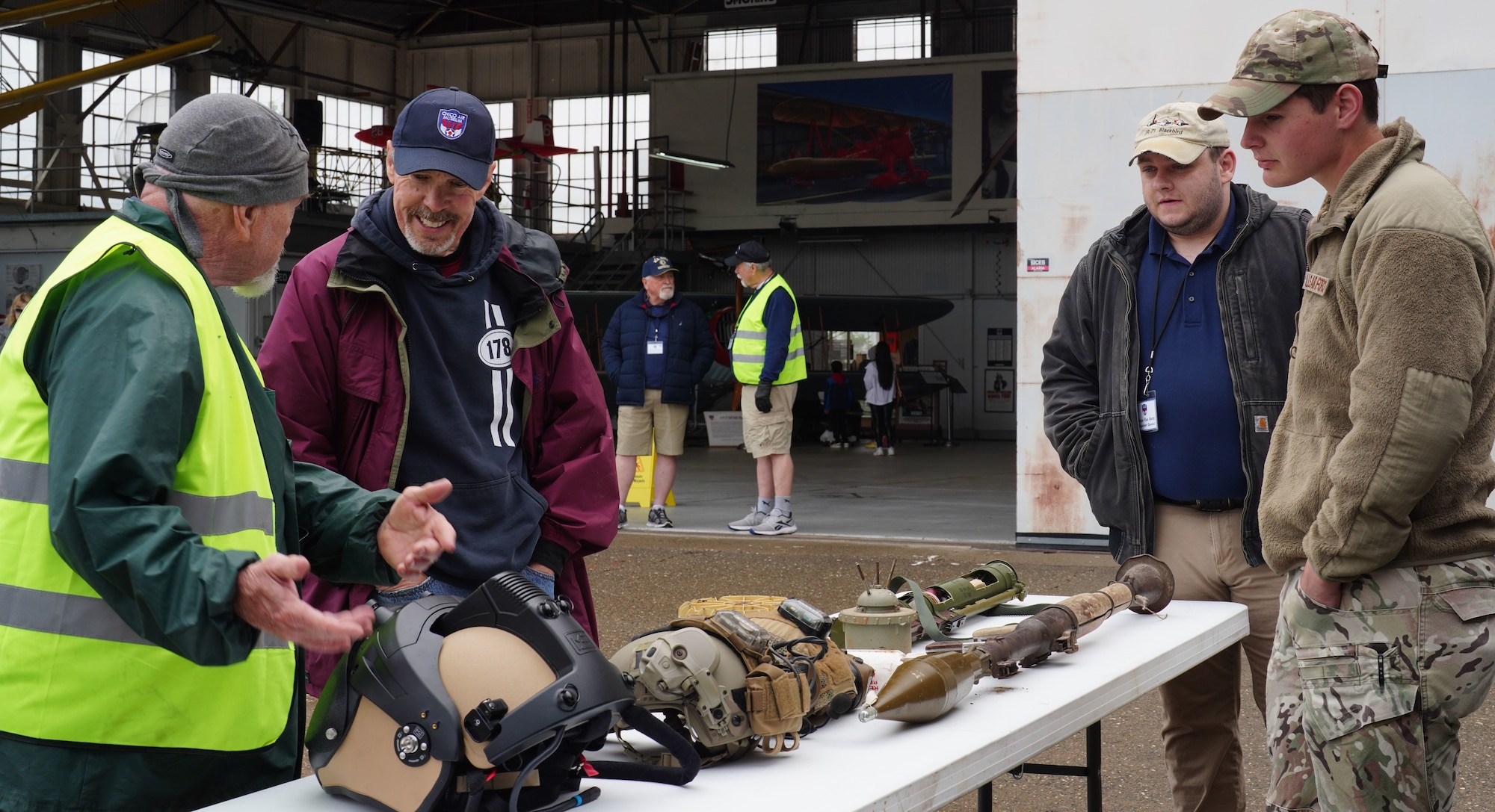 U.S. Air Force Staff Sgt. Hunter Rudnik, 9th Civil Engineer Squadron Explosive Ordnance Disposal technician, showcases EOD equipment to visitors during the Chico Fly-in event, May 6, 2023, at Chico Regional Airport, Chico, California.