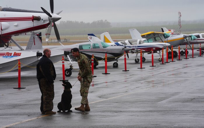U.S. Air Force 9th Security Forces Squadron K-9 unit Airmen conduct a K-9 demonstration during the Chico Fly-in event, May 6, 2023, at the Chico Regional Airport, Chico, California.