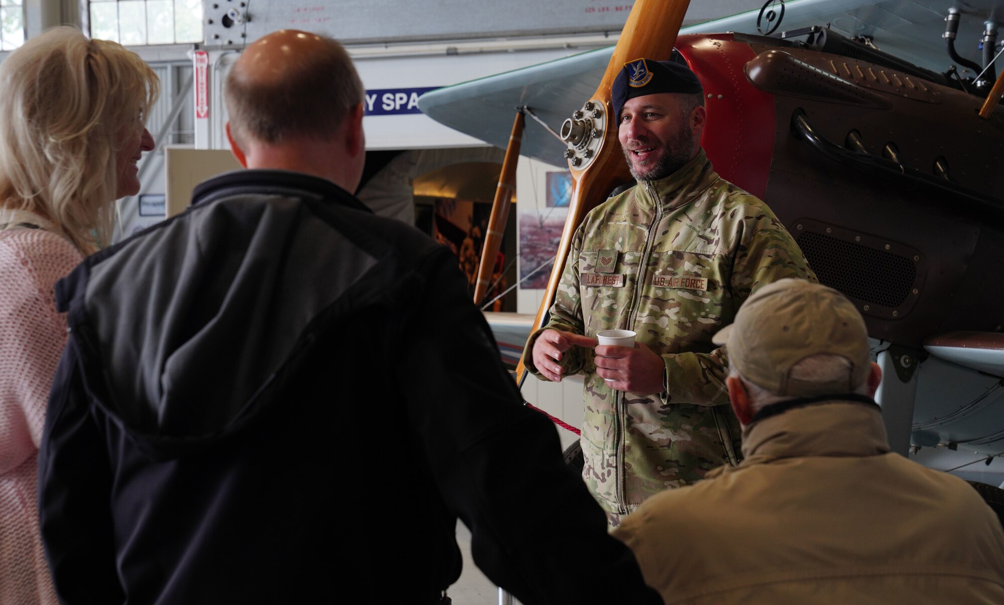 U.S. Air Force Tech. Sgt. Dominic LaForest, 9th Security Forces Squadron kennel master, speaks to visitors at the Chico Fly-in, May 6, 2023, at the Chico Regional Airport, Chico, California.