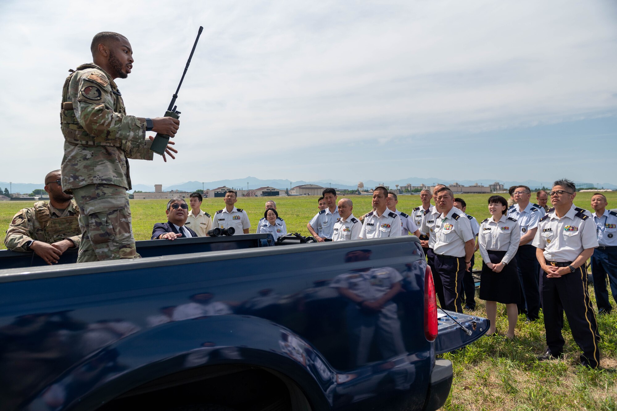 A service member speaks to attendees of the 2023 Senior Enlisted Leader Symposium at Yokota Air Base, Japan.