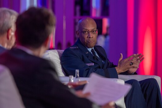  Air Force Chief of Staff Gen. CQ Brown, Jr. answers a question presented by Special Competitive Studies Project CEO Ylli Bajraktari during the Ash Carter Exchange on Innovation and National Security