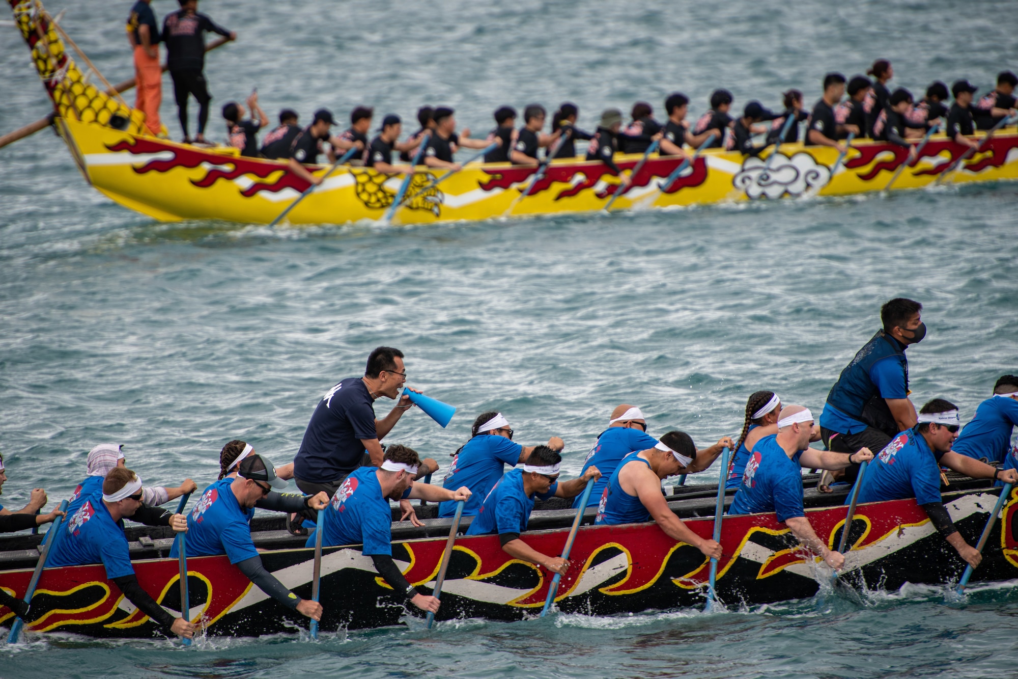 Kadena Air Base’s Shogun Men and the Japan Airline boat race teams compete in the 2023 Naha Hari Dragon Boat Races in Naha City, Japan, May 5, 2023. The races marked the culmination of months of training by U.S. and Japanese teams from across Okinawa. (U.S. Air Force photo by Lt. Col. Raymond Geoffroy)