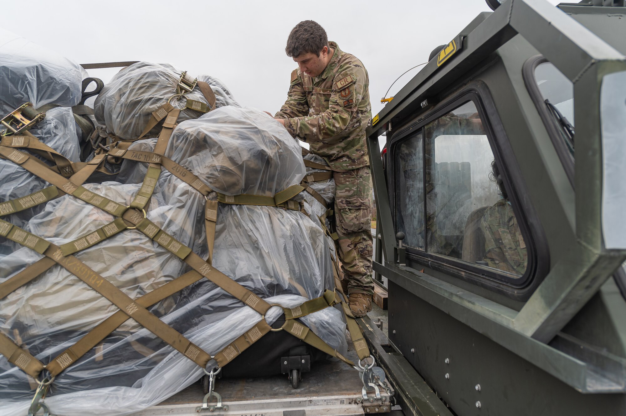 man loads cargo