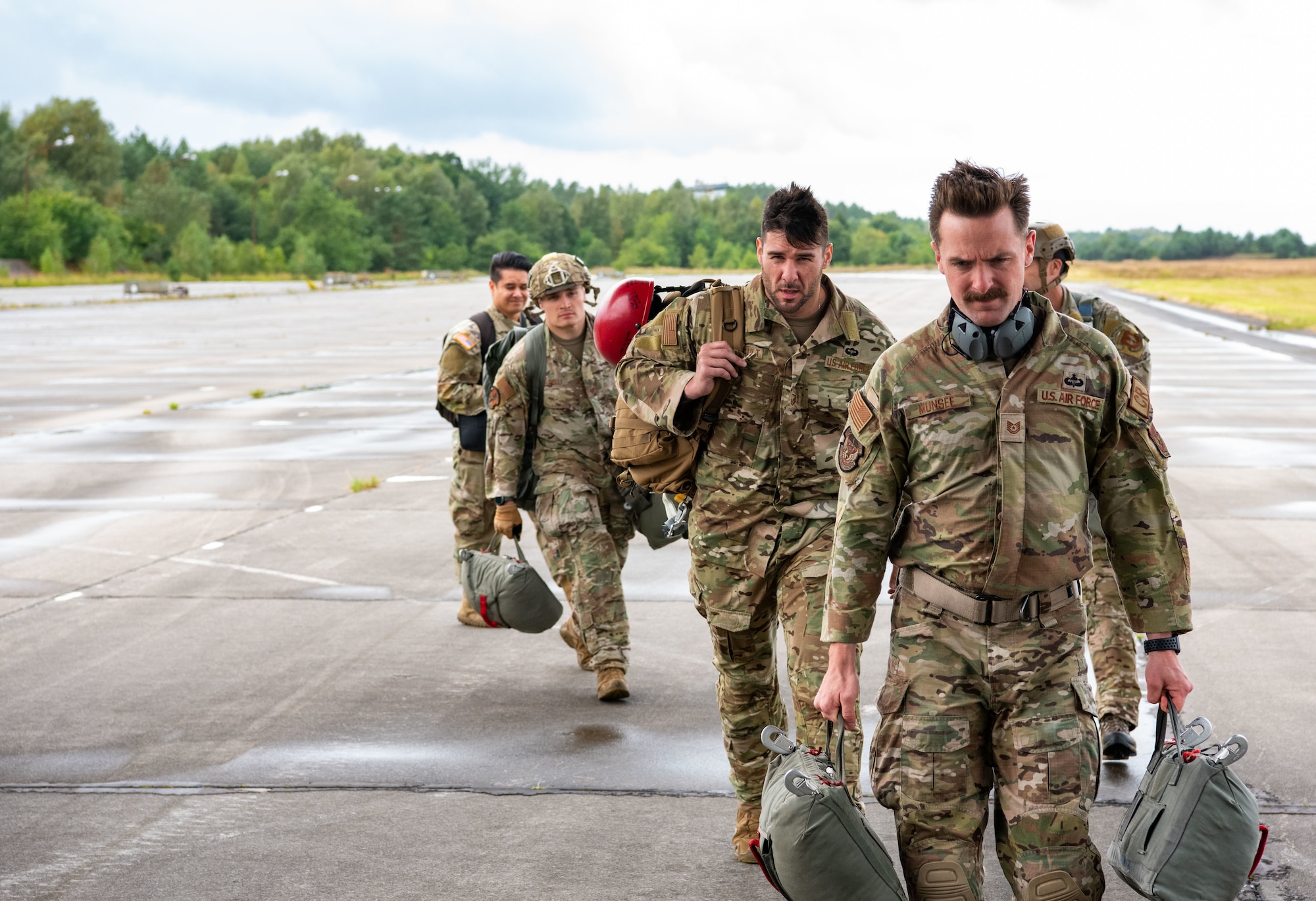 airmen walk together outside