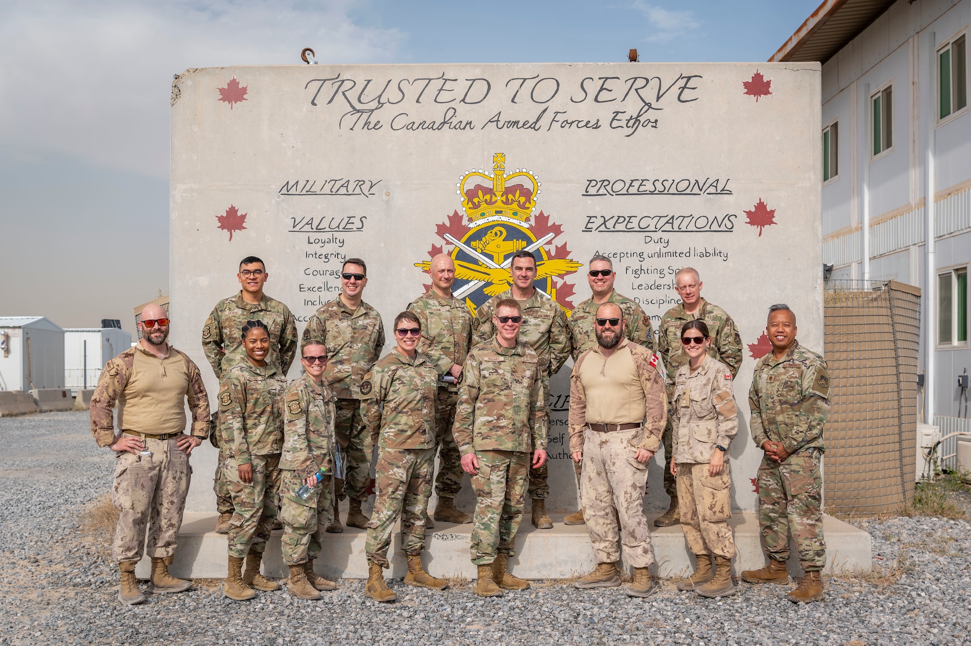 U.S. Air Force Brig. Gen. Robert Bogart, Headquarters Air Combat Command command surgeon, poses for a photo with U.S. and coalition partner medical personnel during a tour at Ali Al Salem Air Base, Kuwait, May 8, 2023.