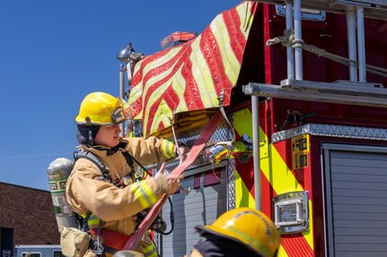 Wyoming Air National Guard firefighters respond to a fire scenario during the Mustang Roller Readiness Exercise at the Wyoming Air National Guard Base in Cheyenne, Wyoming, May 2, 2023.