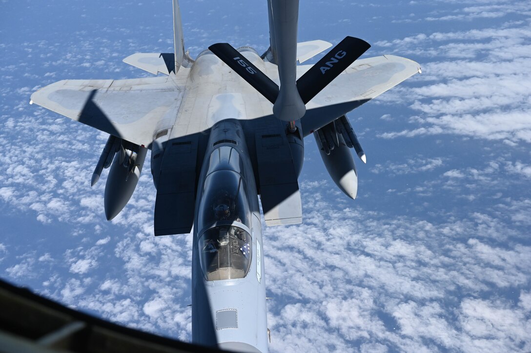 U.S. Air Force F-15C Eagle fighter jet assigned to the California Air National Guard's, 144th Fighter Wing flies up to the boom on Nebraska’s KC-135 Stratotaanker to gas up on April 25, 2023.