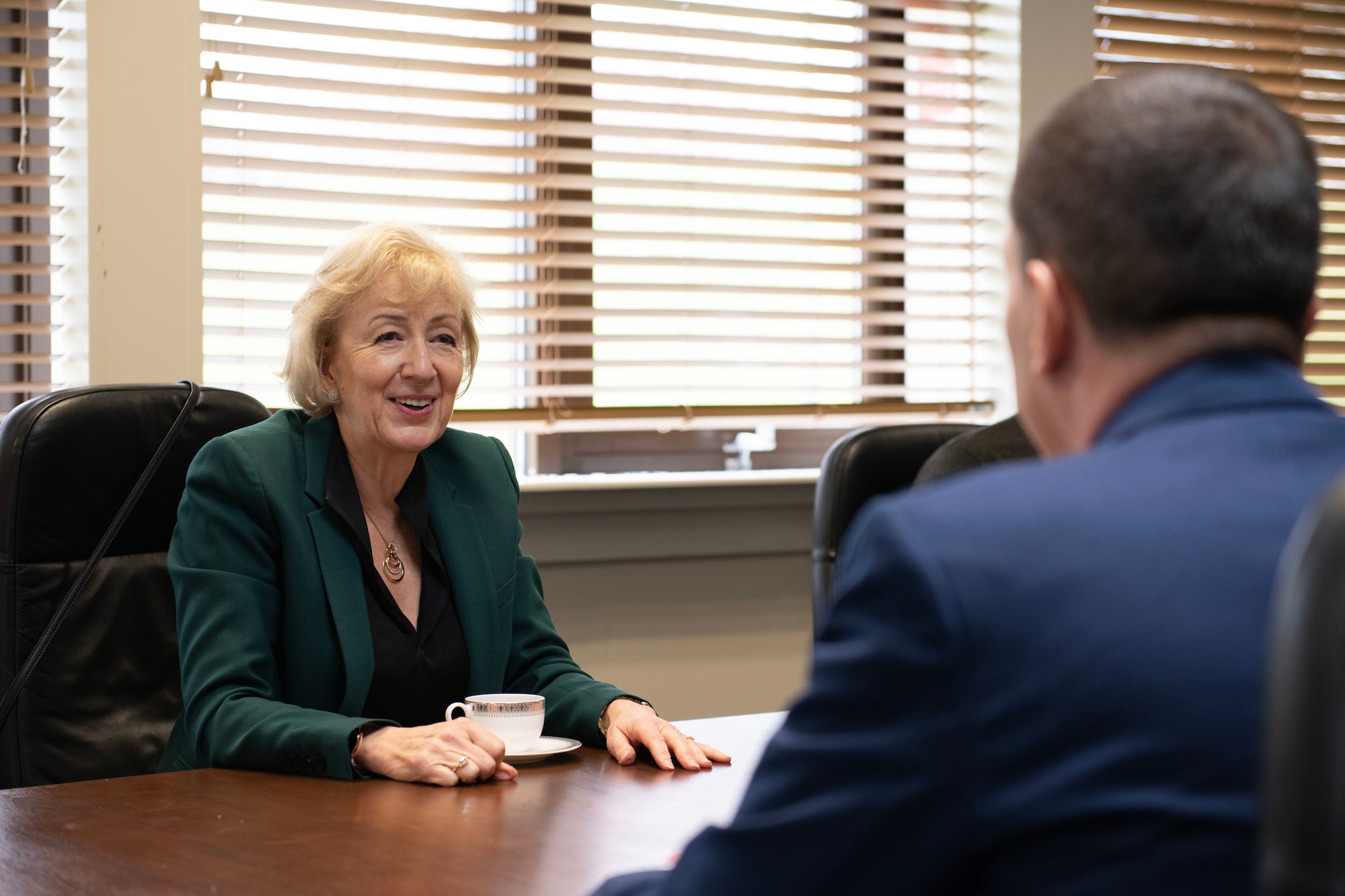 U.S. Air Force Col. Edward Spinelli, right, 422d Air Base Group commander, and Royal Air Force Sqn. Ldr. Tina Sheeran, RAF Alconbury/Croughton/Molesworth RAF commander, met Rt Hon. Dame Andrea Leadsom DBE MP, left, at RAF Croughton, England, April 27, 2023, to discuss topics of interest for the base and local communities. During the meeting they reiterated the close ties between the base and the local community and talked about schooling for the base children, housing in the local area, on base employment for U.K. nationals, and different ways the base can improve security while being as green as possible. (U.S. Air Force photo by Staff Sgt. Jennifer Zima)