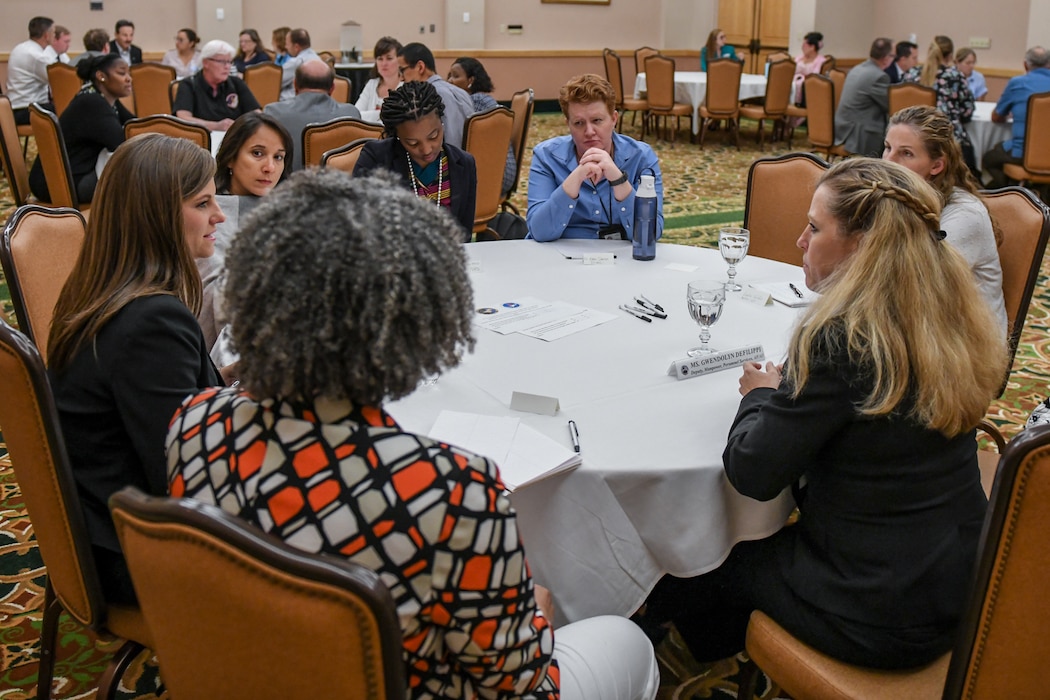 Mrs. Gwendolyn DeFilippi (right), the Principal Assistant to the Deputy Chief of Staff for Manpower, Personnel and Services speaks with Joint Base San Antonio (JBSA) mentees during a mentor session.