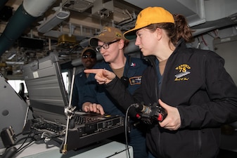 Sailors operate the I-Stalker system in the pilot house aboard USS Gerald R. Ford (CVN 78).