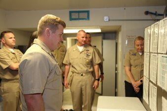 230510-N-YR423-6241 PENSACOLA, Fla. – Navy Diver 1st Class Chase McCain, along with his fellow Naval Education and Training (NETC) domain fiscal year 2022 Sailor of the Year (SOY) candidates, tours the Navy Advancement Center’s scan room during a tour of Naval Education and Training Professional Development Center’s (NETPDC) facilities onboard Saufley Field in Pensacola, Florida, May 10, 2023.  The candidates and their master chiefs toured NETPDC as part of the NETC SOY Recognition Week. (U.S. Navy photo by Cheryl Dengler)