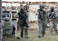 Airmen from the 105th Base Defense Squadron conduct a ground assault during a training exercise at Warren Grove Bombing Range, Ocean County, New Jersey, May 6, 2023. The 105th BDS and the 106th Rescue Wing and Soldiers from the U.S. Army National Guard’s 20th Special Forces Group participated in the exercise.