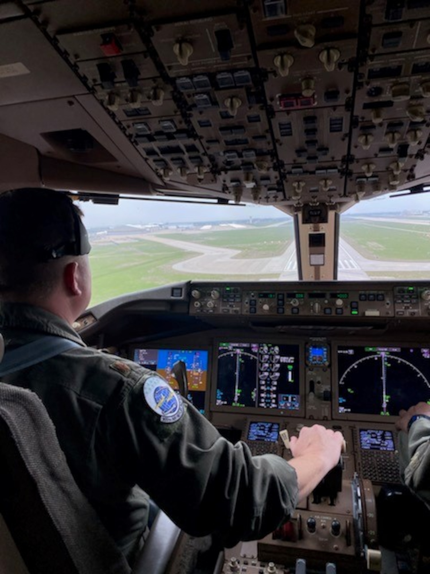 Maj. Jared Thomas, 931st Operations Support Squadron chief of current operations and KC-46A Pegasus pilot, is pictured during takeoff in the cockpit of a KC-46