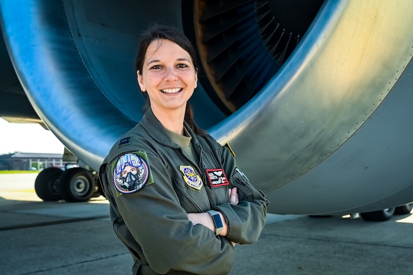 U.S. Air Force Capt. Alicia Canetta, 305th Air Mobility Wing pilot, poses for a flight line photo on 11 May, 2023 at Joint Base McGuire-Dix-Lakehurst, N.J. Canetta is a part of the last crew to fly a local KC-10 Extender sortie from the 305th AMW. The 305th AMW extends America's global reach by generating, mobilizing and deploying KC-10 Extenders and C-17 Globemaster III’s to conduct strategic airlift and air refueling missions worldwide. In November 2021, the Wing began transitioning to the new KC-46A Pegasus air refueling aircraft.