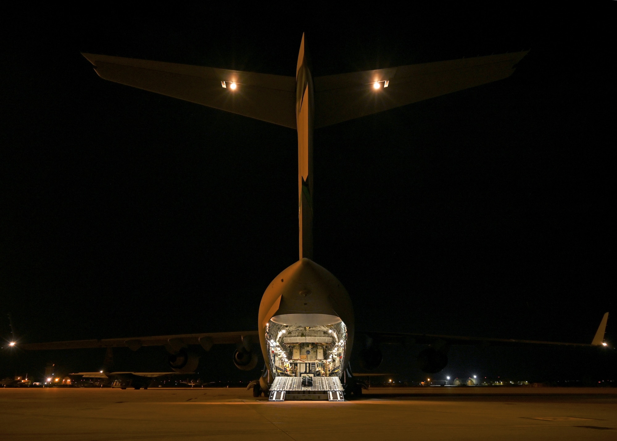 A U.S. Air Force C-17 Globemaster III assigned to Joint Base Lewis-McChord, Washington, prepares for takeoff during DEFENDER 23 at Base Aerea De Zaragoza, Spain, May 10, 2023. DEFENDER 23 is a U.S. Army Europe and Africa-led exercise, supported by U.S. Air Forces in Europe – Air Forces Africa, focused on the strategic deployment of continental United States-based forces and interoperability with Allies and partners. Taking place from April 22 to June 23, DEFENDER 23 demonstrates the U.S. Air Force’s ability to aggregate U.S.-based combat power quickly in Europe; increase lethality of the NATO Alliance through the U.S. Air Force’s Agile Combat Employment; build unit readiness in a complex joint, multi-national environment; and leverage host nation capabilities to increase USAFE-AFAFRICA’s operational reach. DEFENDER 23 includes more than 7,800 U.S. and 15,000 multi-national service members from various Allied and partner nations. (U.S Air Force photo by Senior Airman Callie Norton)