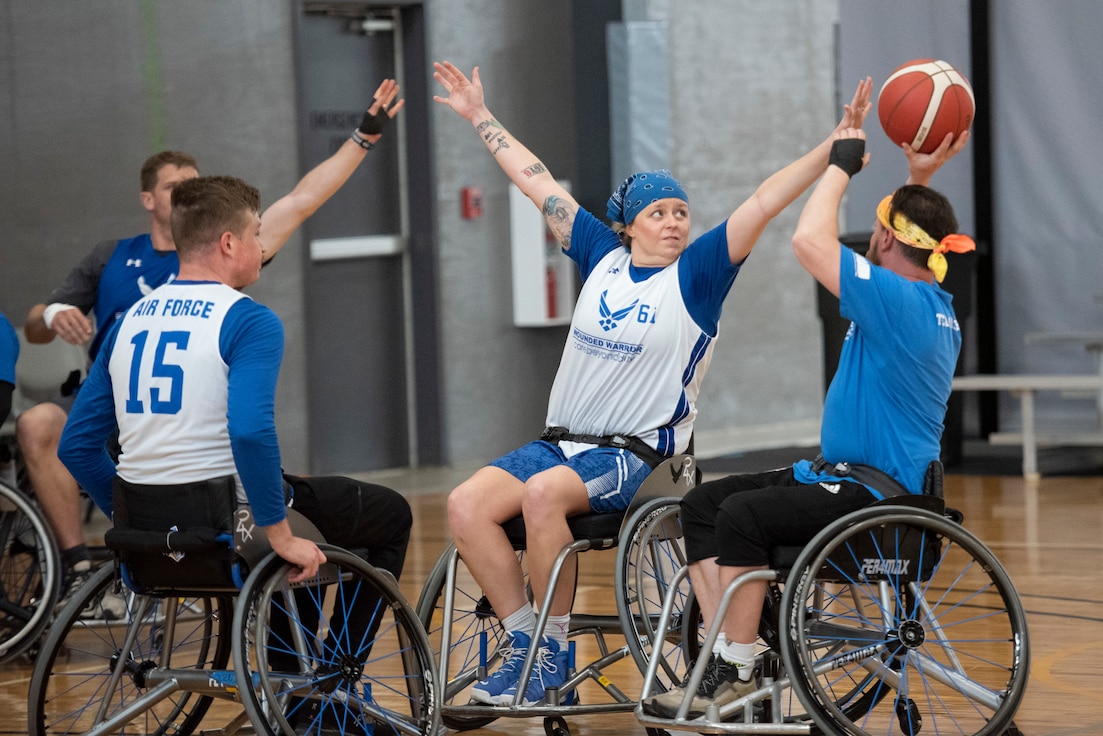 RSMs practice wheelchair basketball.