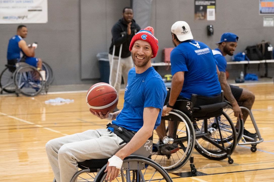 An RSM smiles during basketball practice.