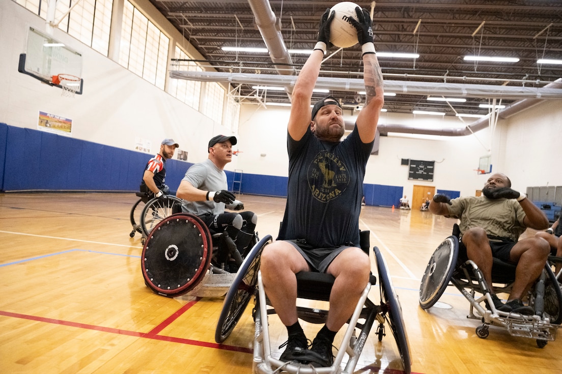 An RSM scores during wheelchair rugby practice.