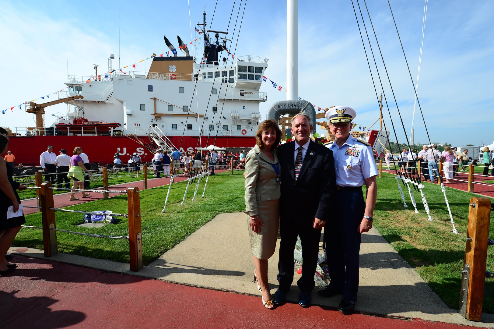 Cmdr. Mike Smith, center, at the 2013 Coast Guard Festival in Grand Haven, MI., Thurs. Aug. 2, 2013.