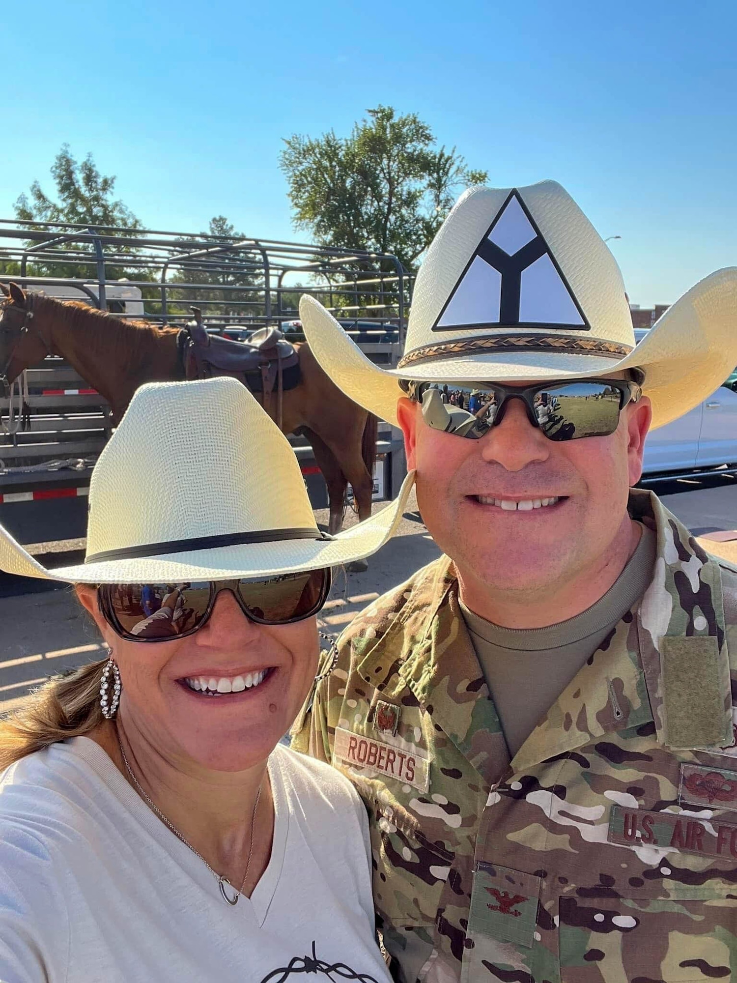 U.S. Air Force Col. Daniel Roberts, 97th Medical Group commander, poses for a photo with his wife, Christi, during the annual cattle drive at Altus Air Force Base, Oklahoma, Aug. 25, 2022. Daniel and Christi have two sons, Alex and Austin, who love to travel wherever they are stationed. (courtesy photo)