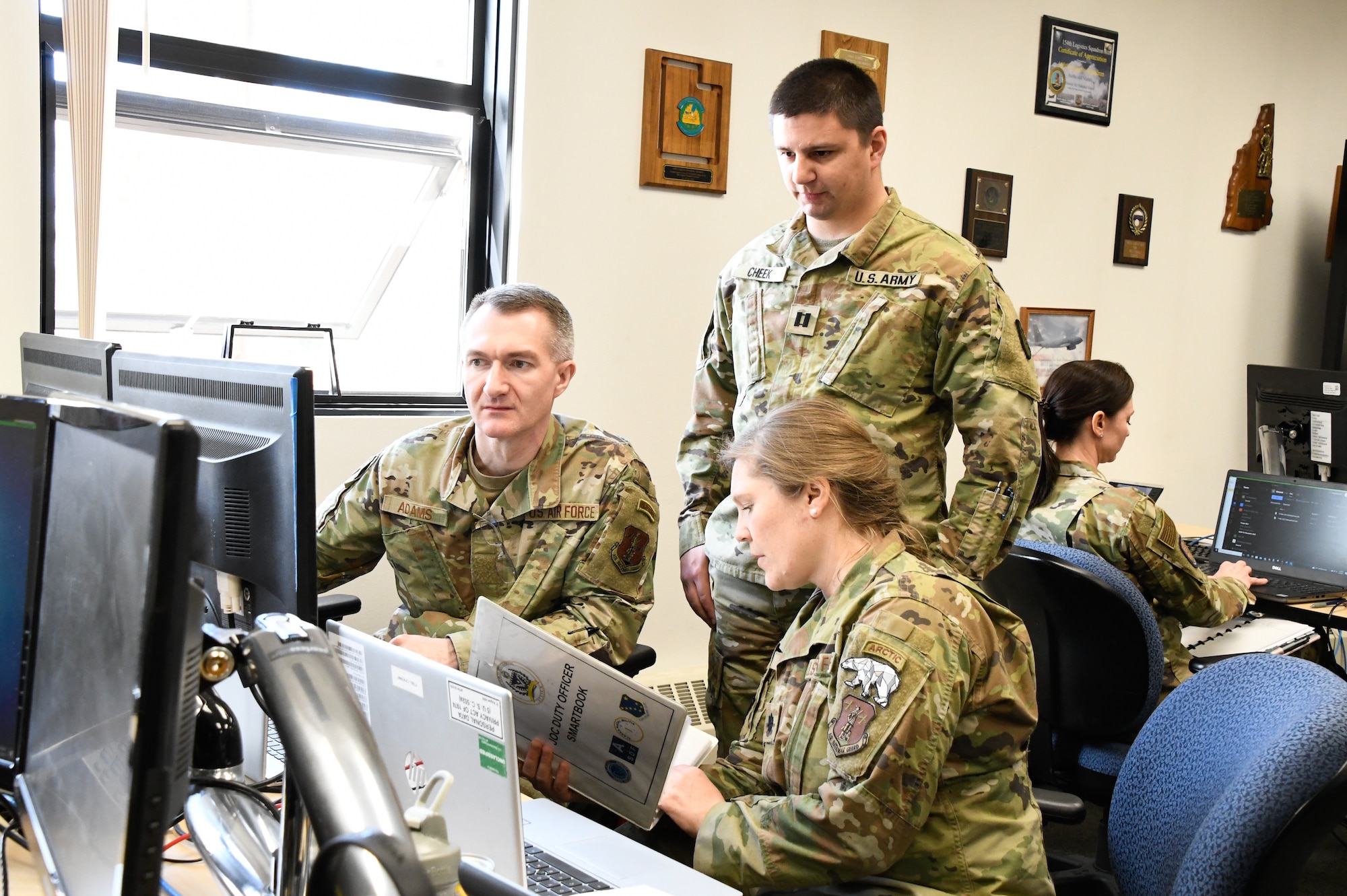 The Alaska Air and Army National Guard Joint Operations Center members coordinate and implement emergency operations plans while conducting an earthquake continuity of operation (COOP) exercise at Eielson Air Force Base, Alaska, May 1-5, 2023. The exercise focused on immediate response efforts to a 9.2 magnitude earthquake and tsunami scenario, including emergency communications to respond to the seismic zone and coordination with local, state, and federal support agencies. The members of the operations center operated during the exercise under the knowledge of public utilities disrupted and widespread infrastructure damage in southern Alaska and coastal communities. (Alaska Air National Guard photo by Senior Master Sgt. Julie Avey)