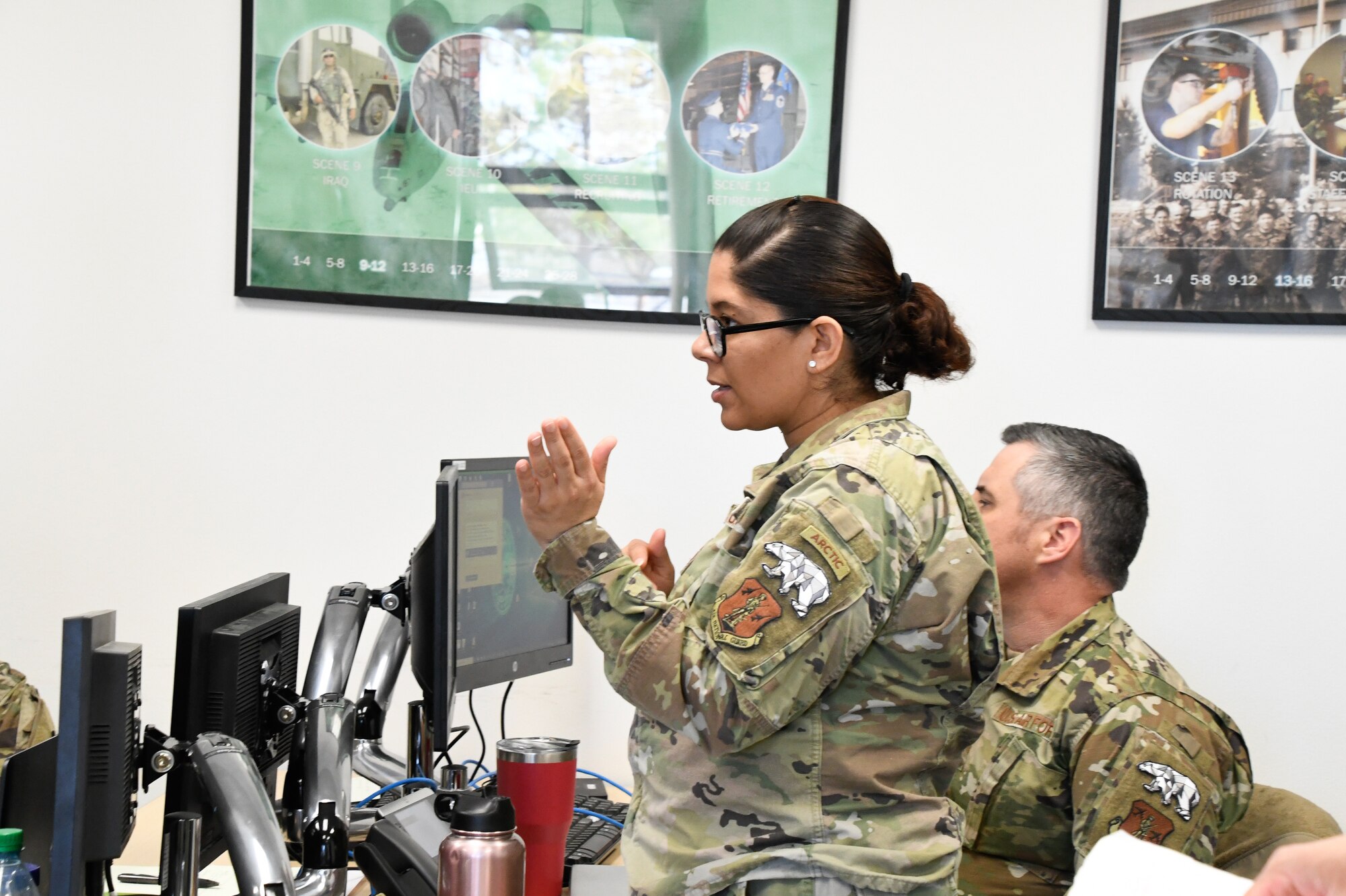 Master Sgt. Jezabelle Oneill, 168th Wing Manpower and Personnel Senior Enlisted Advisor provides operational and accountability updates during an earthquake continuity of operation (COOP) exercise at Eielson Air Force Base, Alaska, May 1-5, 2023. The exercise focused on immediate response efforts to a 9.2 magnitude earthquake and tsunami scenario, including emergency communications to respond to the seismic zone and coordination with local, state, and federal support agencies. The members of the operations center operated during the exercise under the knowledge of public utilities disrupted and widespread infrastructure damage in southern Alaska and coastal communities. (Alaska Air National Guard photo by Senior Master Sgt. Julie Avey)