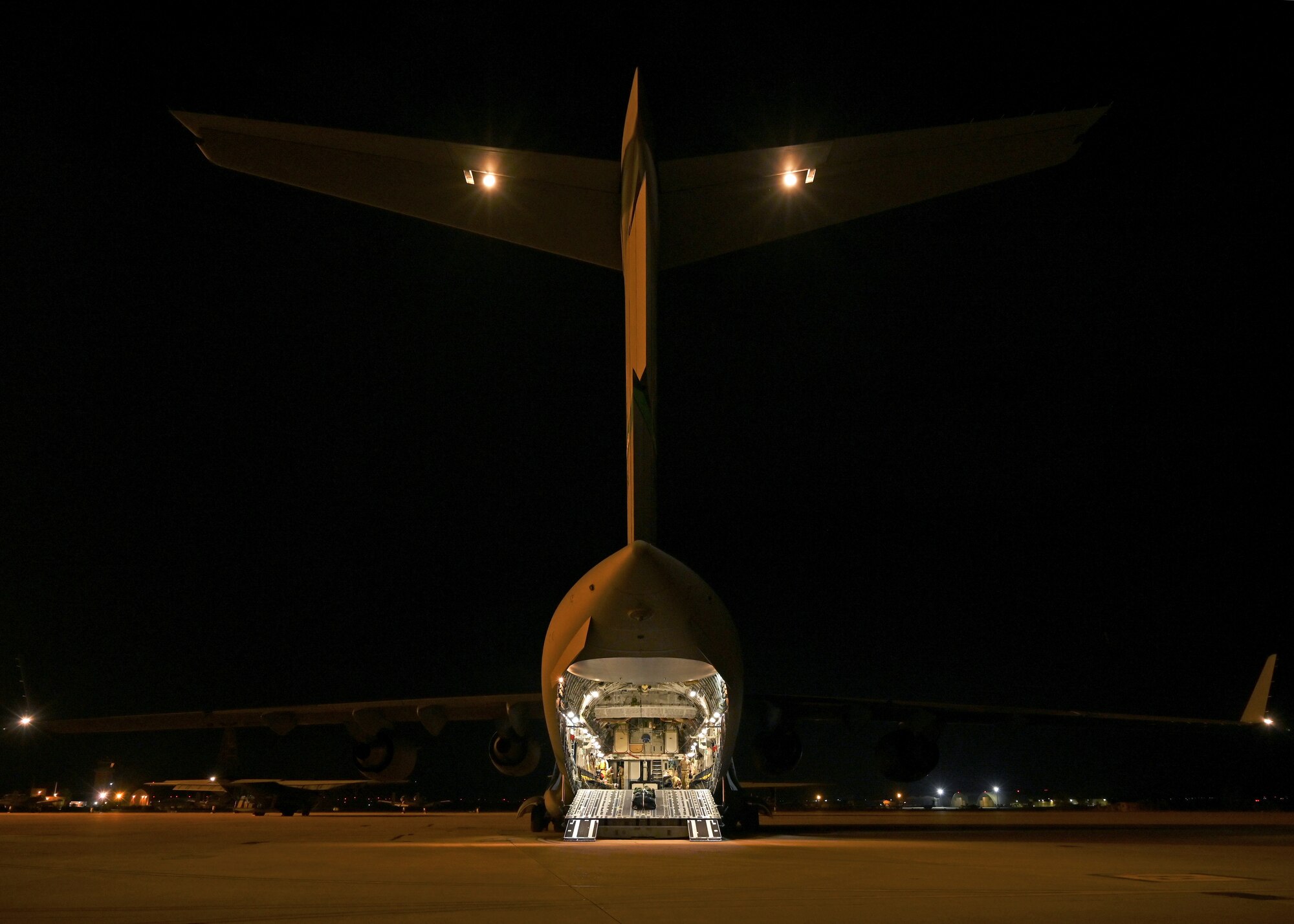 A U.S. Air Force C-17 Globemaster III assigned to Joint Base Lewis-McChord, Washington, prepares for takeoff during DEFENDER 23 at Base Aerea De Zaragoza, Spain, May 10, 2023. DEFENDER 23 is a U.S. Army Europe and Africa-led exercise, supported by U.S. Air Forces in Europe – Air Forces Africa, focused on the strategic deployment of continental United States-based forces and interoperability with Allies and partners. Taking place from April 22 to June 23, DEFENDER 23 demonstrates the U.S. Air Force’s ability to aggregate U.S.-based combat power quickly in Europe; increase lethality of the NATO Alliance through the U.S. Air Force’s Agile Combat Employment; build unit readiness in a complex joint, multi-national environment; and leverage host nation capabilities to increase USAFE-AFAFRICA’s operational reach. DEFENDER 23 includes more than 7,800 U.S. and 15,000 multi-national service members from various Allied and partner nations. (U.S Air Force photo by Senior Airman Callie Norton)