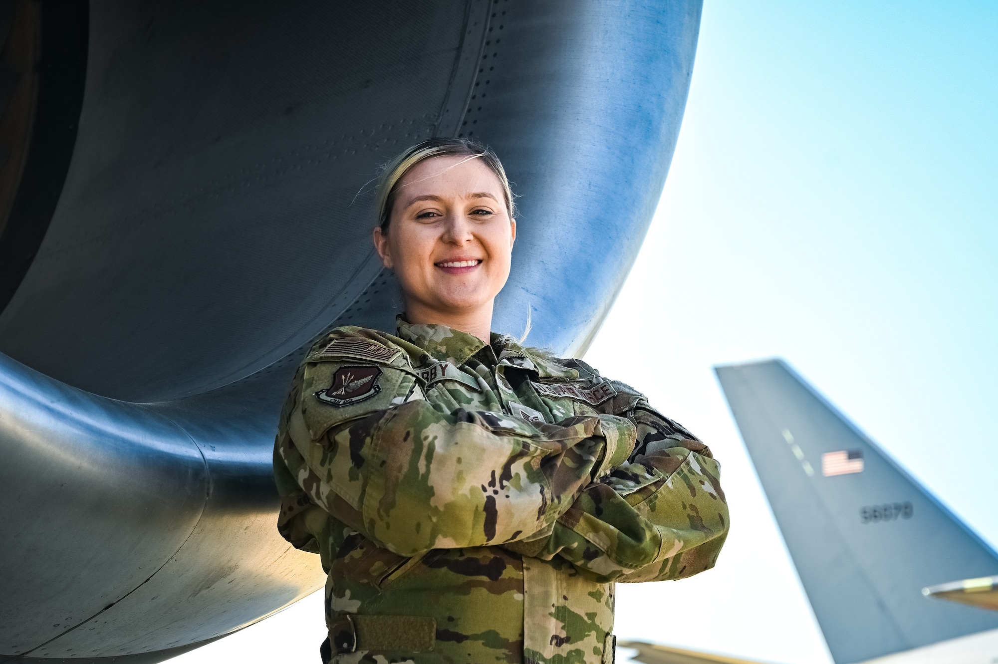 U.S. Air Force Tech. Sgt. Tiffany Irby, 305th Air Mobility Wing boom operator, poses for a flight line photo on 11 May, 2023 at Joint Base McGuire-Dix-Lakehurst, N.J. Irby is a part of the last crew to fly a local KC-10 Extender sortie from the 305th AMW. The 305th AMW extends America's global reach by generating, mobilizing and deploying KC-10 Extenders and C-17 Globemaster III’s to conduct strategic airlift and air refueling missions worldwide. In November 2021, the Wing began transitioning to the new KC-46A Pegasus air refueling aircraft.