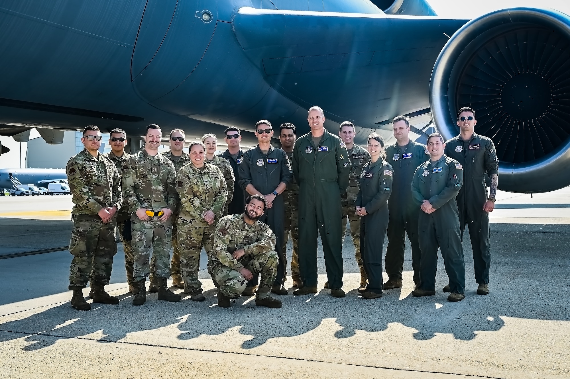 U.S. Air Force Airmen assigned to the 305th Air Mobility Wing, pose for a flight line photo on 11 May, 2023 at Joint Base McGuire-Dix-Lakehurst, N.J. The Aircrew is the last crew to fly a local KC-10 Extender sortie from the 305th AMW. The 305th AMW extends America's global reach by generating, mobilizing and deploying KC-10 Extenders and C-17 Globemaster III’s to conduct strategic airlift and air refueling missions worldwide. In November 2021, the Wing began transitioning to the new KC-46A Pegasus air refueling aircraft.