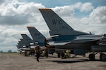 A 14th Aircraft Maintenance Unit crew chief conducts preflight checks on a F-16 Fighting Falcon before a flight during Cope Thunder at Clark Air Base, Philippines, May 4, 2023. Training exercises like these enhance capability and interoperability, while strengthening trust between like-minded nations to ensure the air, maritime, cyber and space domains remain open to all nations. (U.S. Air Force photo by Senior Airman Sebastian Romawac)