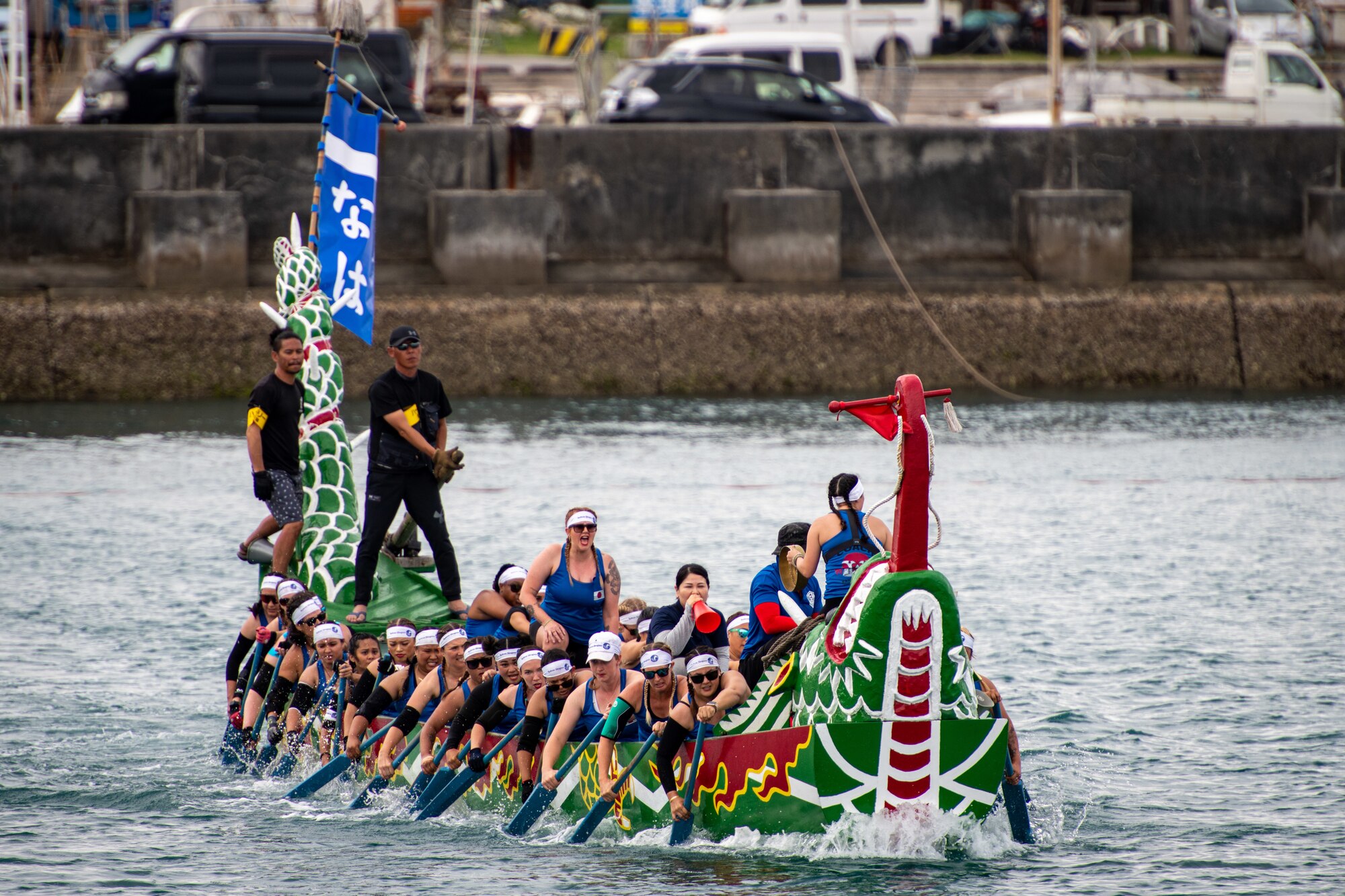 Kadena Air Base’s Shogun Women boat race team competes in the 2023 Naha Hari Dragon Boat Races in Naha City, Japan, May 5, 2023. Two teams from Kadena Air Base faced off against other U.S. and Japanese boat teams in the annual tradition. (U.S. Air Force photo by Lt. Col. Raymond Geoffroy)