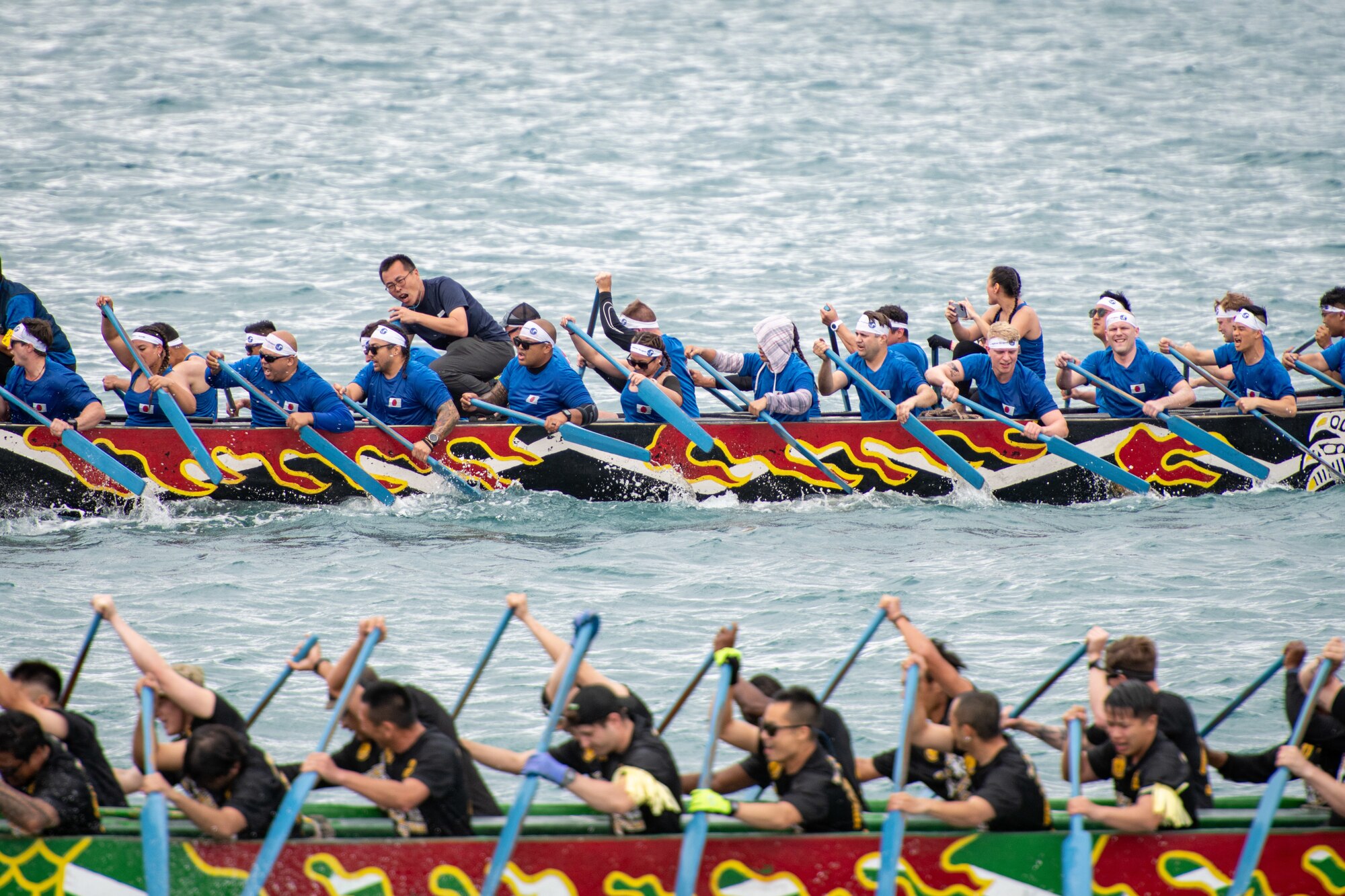 Kadena Air Base’s Shogun Men and the Black Knights boat race teams compete in the 2023 Naha Hari Dragon Boat Races in Naha City, Japan, May 5, 2023. The races marked the culmination of months of training by U.S and Japanese teams from across Okinawa. (U.S. Air Force photo by Lt. Col. Raymond Geoffroy)