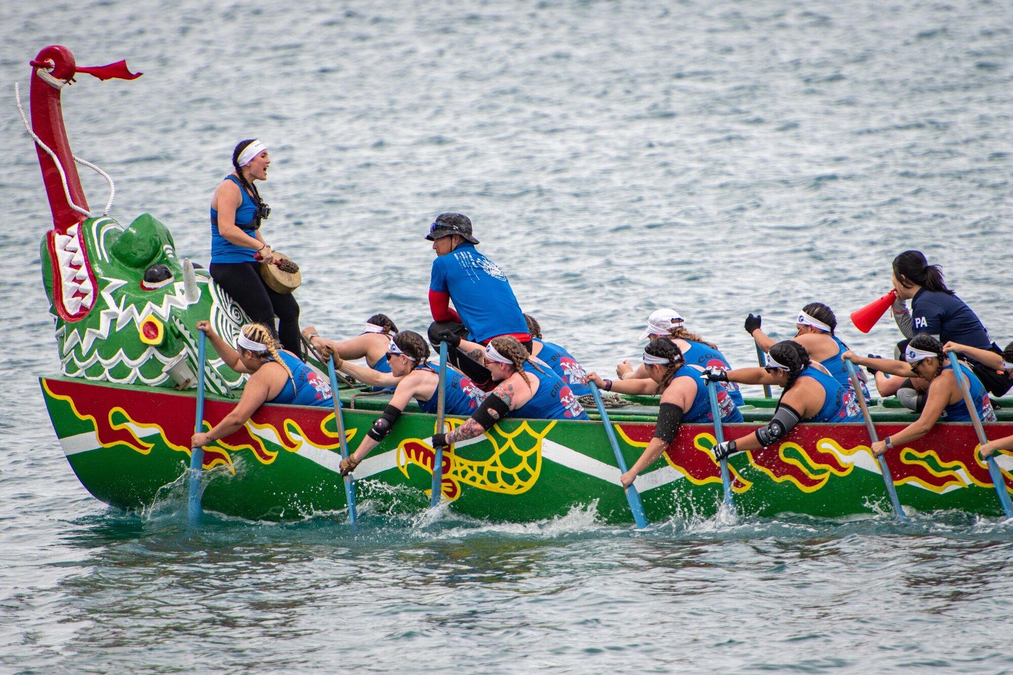 Kadena Air Base’s Shogun Women boat race team competes in the 2023 Naha Hari Dragon Boat Races in Naha City, Japan, May 5, 2023. Two teams from Kadena Air Base faced off against other U.S. and Japanese boat teams in the annual tradition. (U.S. Air Force photo by Lt. Col. Raymond Geoffroy)
