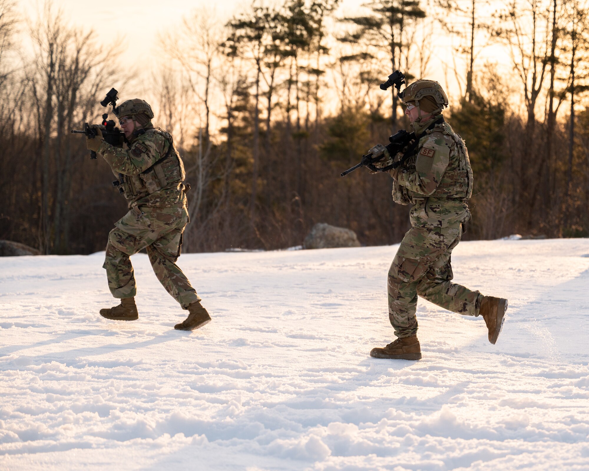 Tech. Sgt. Ryan Welch and Senior Airman Christian Montembeau, members of the 157th Security Forces Squadron, clear a training village