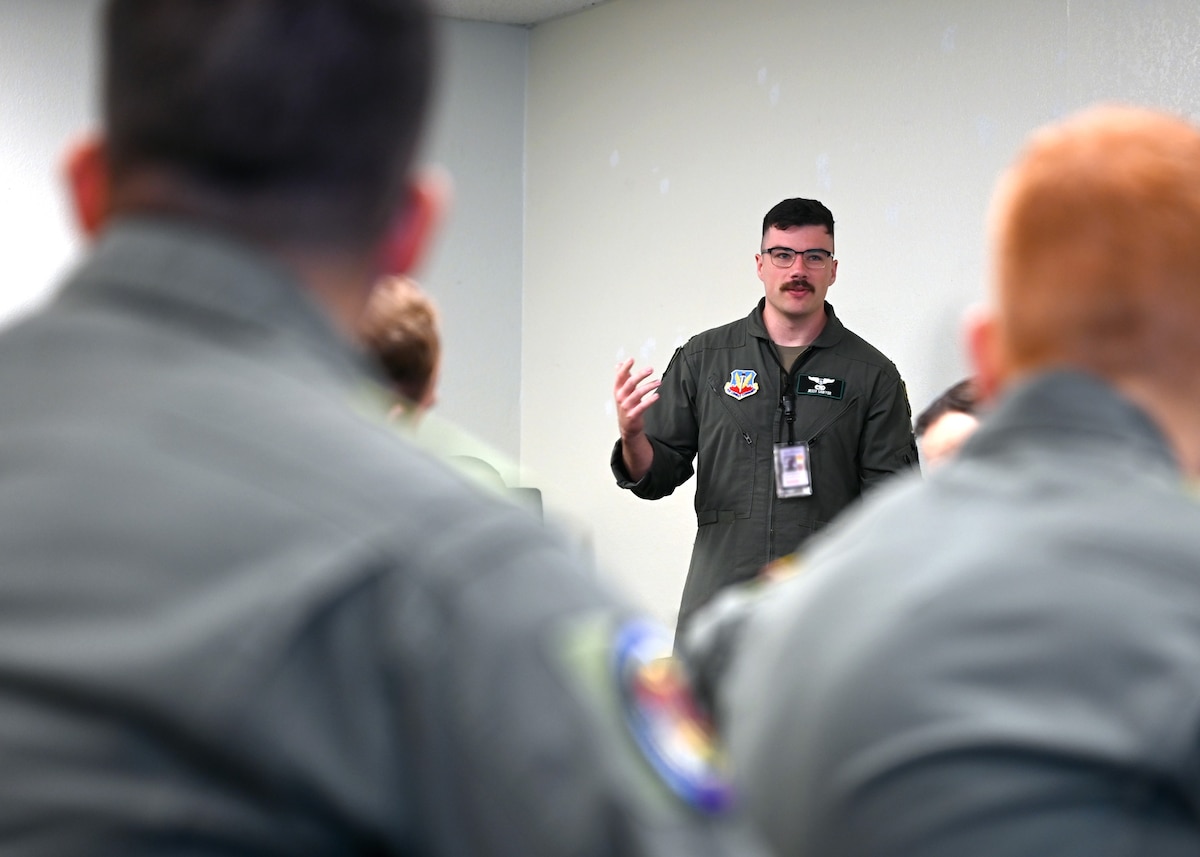 A service member introduces himself to joint services and coalition partners during the Joint Warfighter Planning Course for the RED FLAG-Rescue 23-1 training exercise, Davis-Monthan Air Force Base, Ariz., May 4, 2023. Building foreign relationships and partner capability amplifies U.S. military strength and power in future warfare. (U.S. Air Force photo by Staff Sgt. Abbey Rieves)