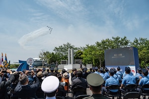 United States and Republic of Korea members watch the ROK aerobatic team, the Black Eagles, perform an aerial maneuver to honor retired Col. Dean Hess during a commemorative ceremony at Jeju Aerospace Museum, Jeju, Republic of Korea, May 11, 2023