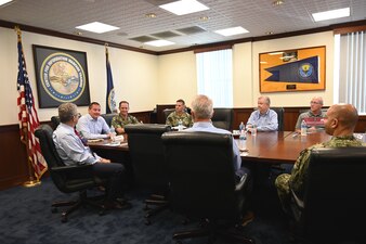Navy Chief Information Officer Manuel Hermosilla visited the Center for Information Warfare Training (CIWT) and spoke with Capt. Christopher Bryant, commanding officer, CIWT; Cmdr. Peter Manzoli, commanding officer, Information Warfare Training Command Corry Station; and CIWT Staff about information warfare training at IWTC Corry Station on May 10, 2023.