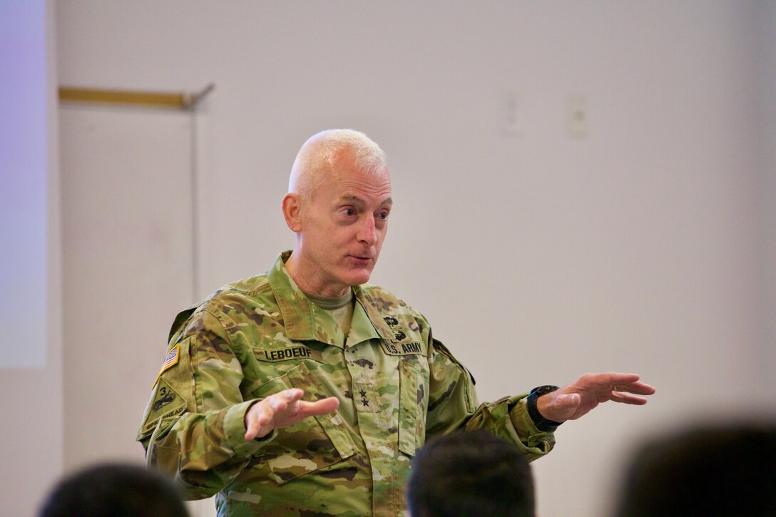 Maj. Gen. Eugene Leboeuf, U.S. Army Reserve Command deputy commanding general, is pictured in a classroom gesturing with his hands while providing opening remarks in Austin, Texas