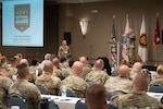 Lt. Gen. Jon Jensen, right, director of the Army National Guard, speaks with more than 250 Army Guard officers and senior noncommissioned officers at the annual Army National Guard G1 Military Personnel Office workshop in Orlando, Florida, May 2-4, 2023. The conference marked the first time the group has met in person since before the COVID-19 pandemic began three years ago.