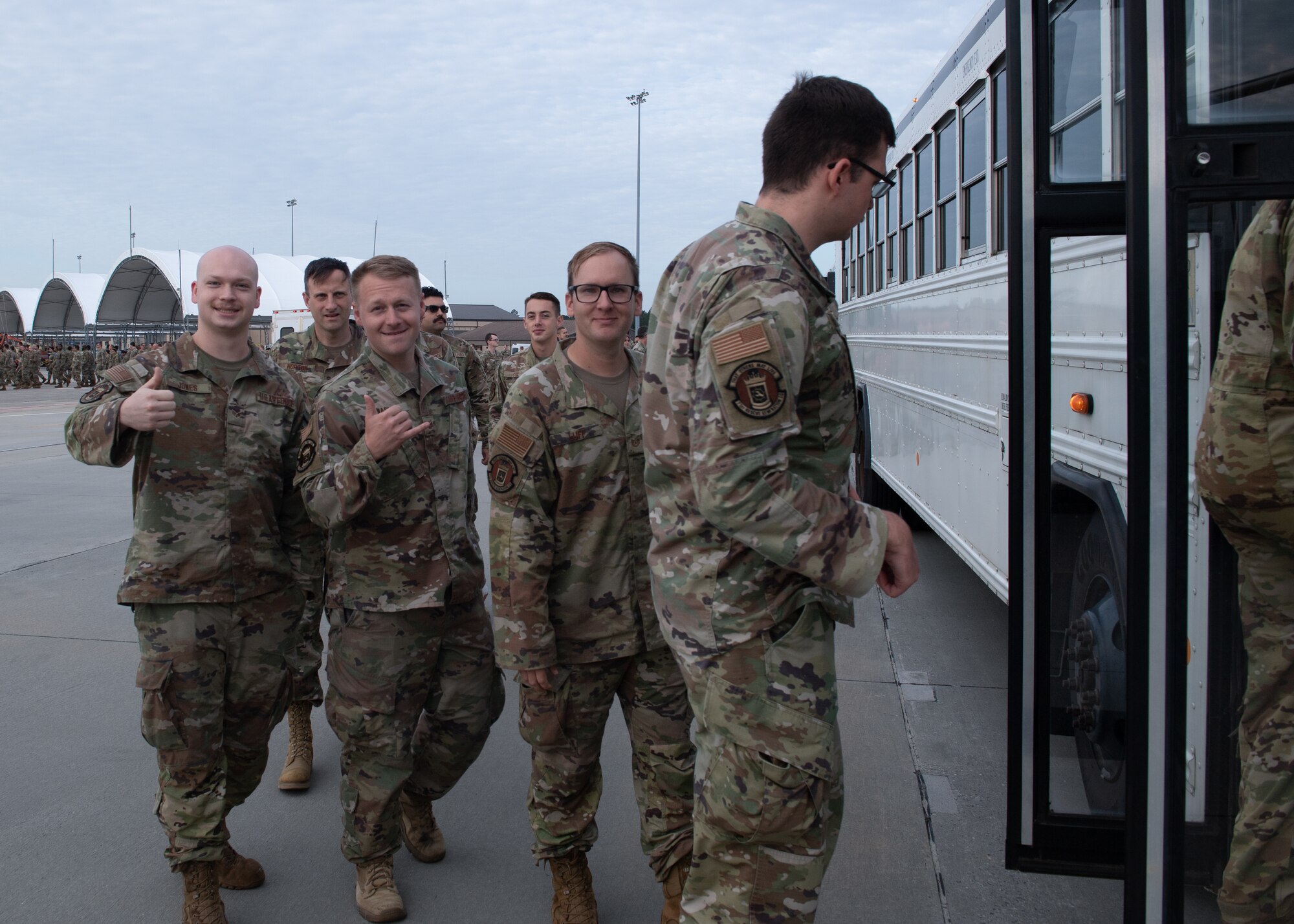 Airman board a bus.