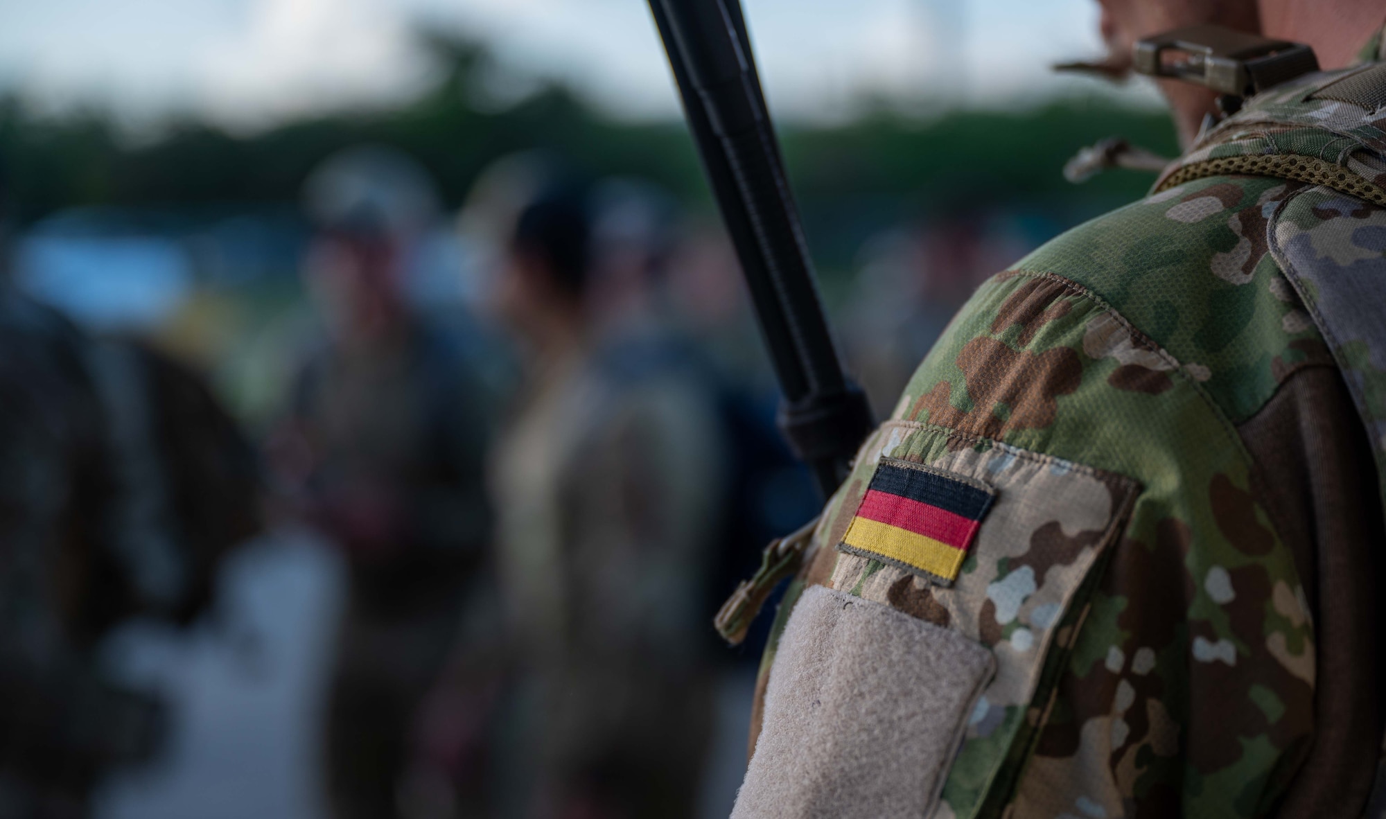 A German combat controller observes U.S. Air Force Special Tactics Operators during Emerald Warrior 23 at Mercedita Airport, Puerto Rico, May 1, 2023.