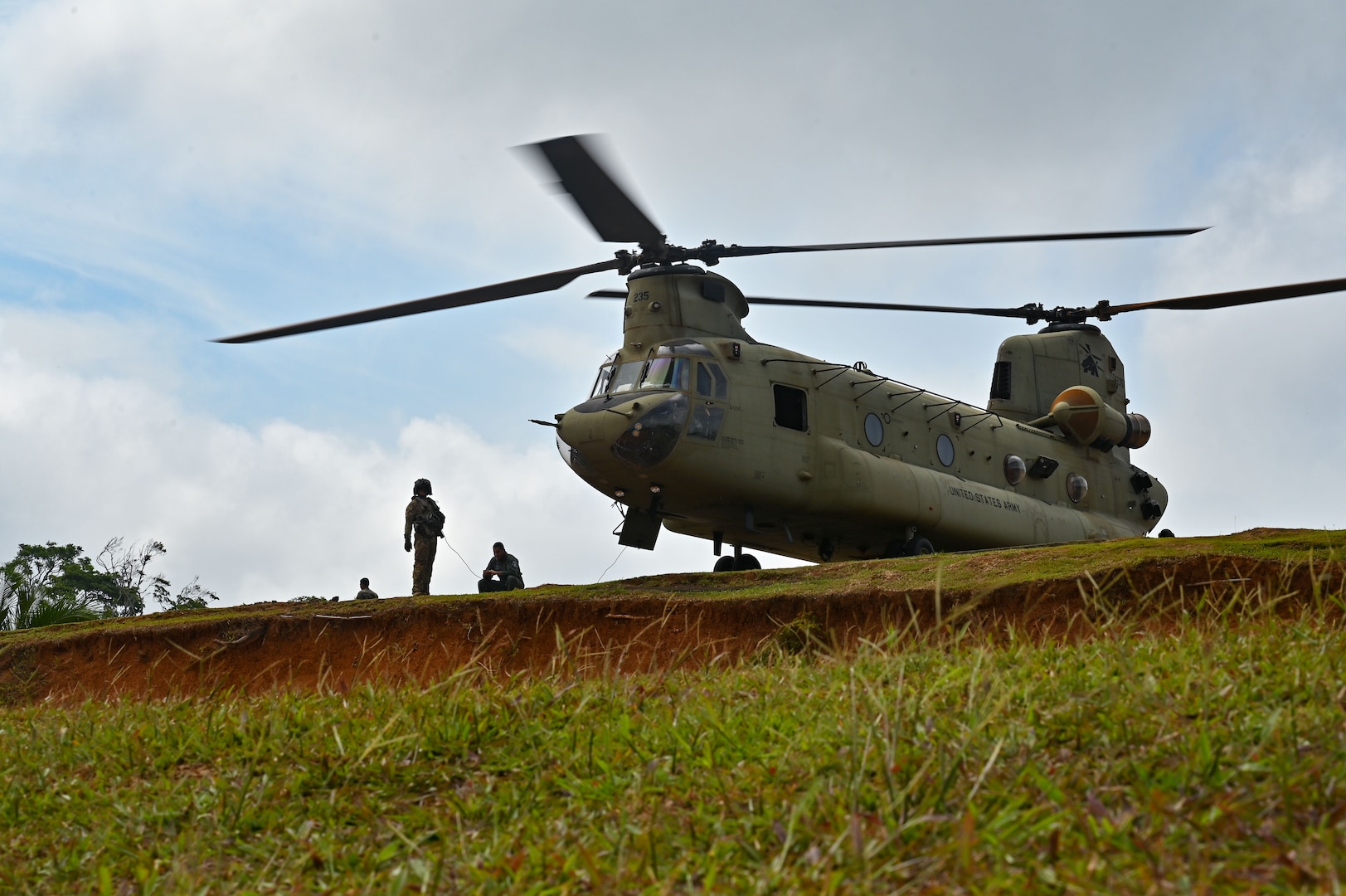 A CH-47 Chinook crew assigned to the 1st Battalion, 228th Aviation Regiment, await movement orders during exercise Keel Billed Toucan (known locally as Mercurio V) at a remote location in Panama May 7, 2023.