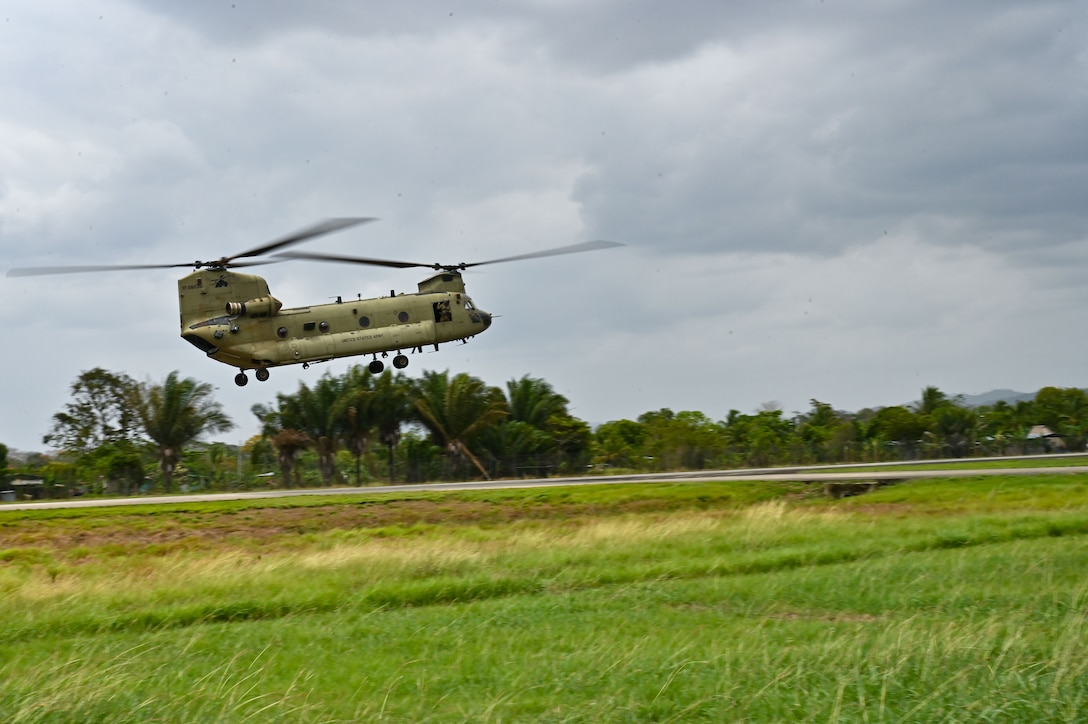 A CH-47 Chinook assigned to the 1st Battalion, 228th Aviation Regiment prepares to land during exercise Keel Billed Toucan 2023 at a Servicio Nacional Aeronaval (SENAN) base May 7, 2023, in Nicanor, Panama.