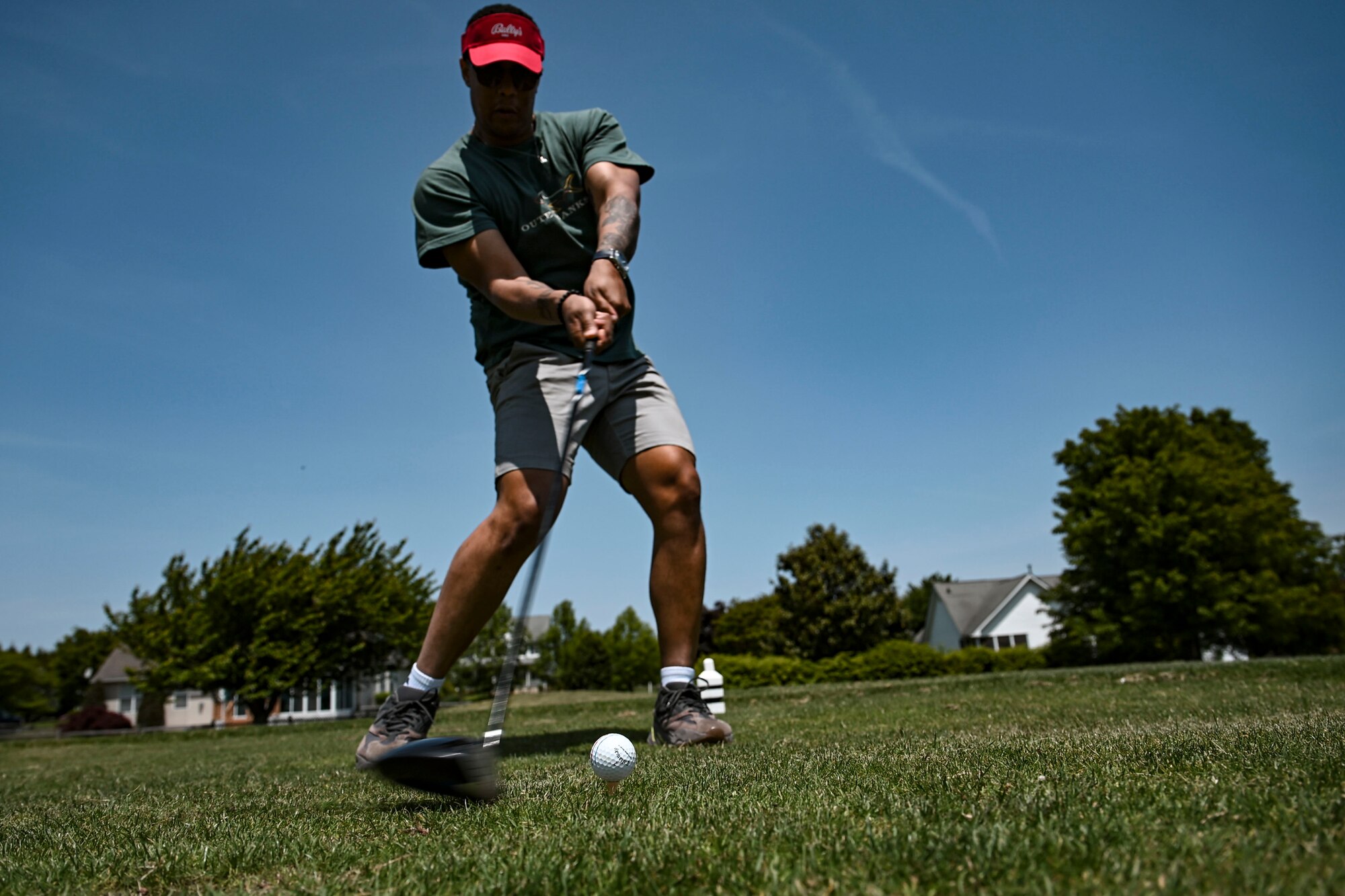 Tech. Sgt. Tarod Fleming, 712th Aircraft Maintenance Squadron admin, tees off during the Bluesuiters Golf Tournament at Jonathan’s Landing Golf Course in Magnolia, Delaware, May 11, 2023. Bluesuiters is a biannual golf tournament aimed at connecting Team Dover Airmen with local civic and business leaders. (U.S. Air Force photo by Staff Sgt. Marco A. Gomez)