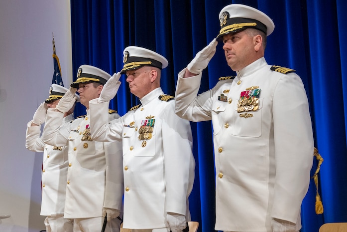 Capt. Matthew Tardy (right) relieves Capt. Todd E. Hutchison (second to right) as Commanding Officer of Naval Surface Warfare Center, Carderock Division, during a change of command ceremony in West Bethesda, Md., on May 12. (U.S. Navy photo by Devin Pisner)