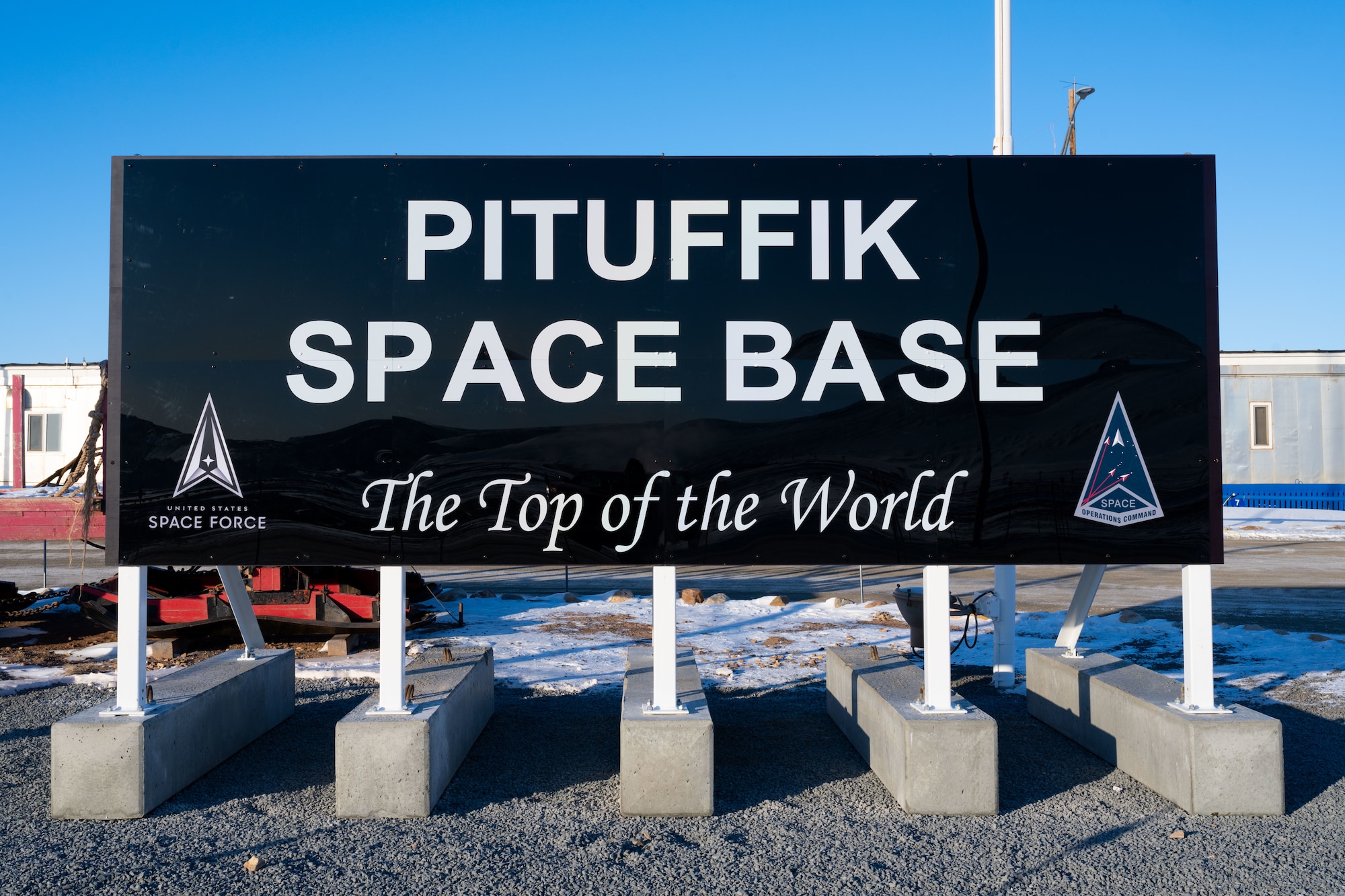 PITUFFIK SPACE BASE, Greenland - The new Pituffik Space Base sign showcased at the headquarters building at Pituffik Space Base, Greenland, April 6, 2023. Pituffik, previously known as Thule Air Base, was renamed April 6, 2023. The renaming better reflects the base’s role in the U.S. Space Force, while paying homage to its ties to the Greenlandic people and culture. (U.S. Space Force photo by Senior Airman Kaitlin Castillo)