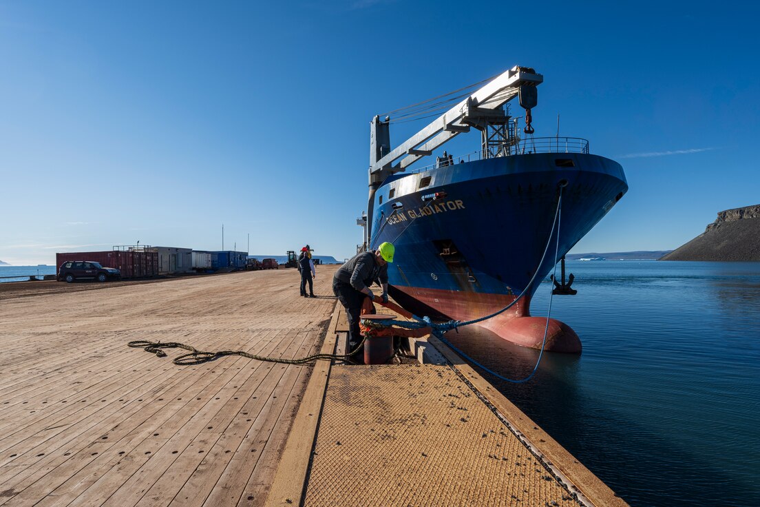 PITUFFIK SPACE BASE, Greenland – The cargo ship, Ocean Gladiator, casts off from the port at  Pituffik Space Base, Greenland, after successfully delivering cargo as part of the annual resupply mission, Operation Pacer Goose, Aug. 8, 2022. Since 1952, Pacer Goose has delivered vital supplies and equipment to the base every summer. Located 750 miles north of the Arctic Circle, Pituffik SB is home to the northernmost deep-water port in the world, and depends on supplies delivered during the operation to survive the long, harsh winter season. (U.S. Space Force photo by Paul Honnick)