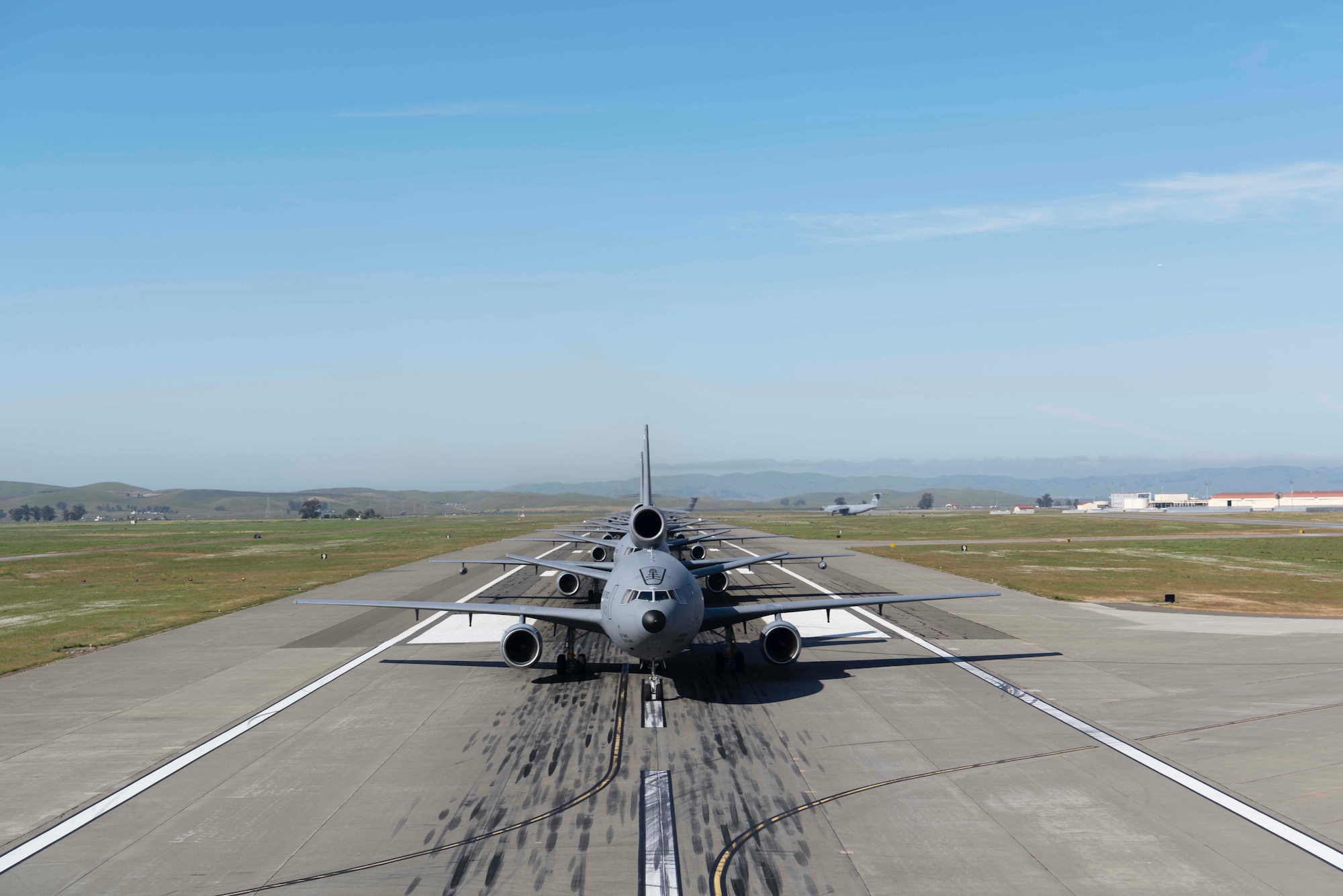 A formation of planes on the runway.